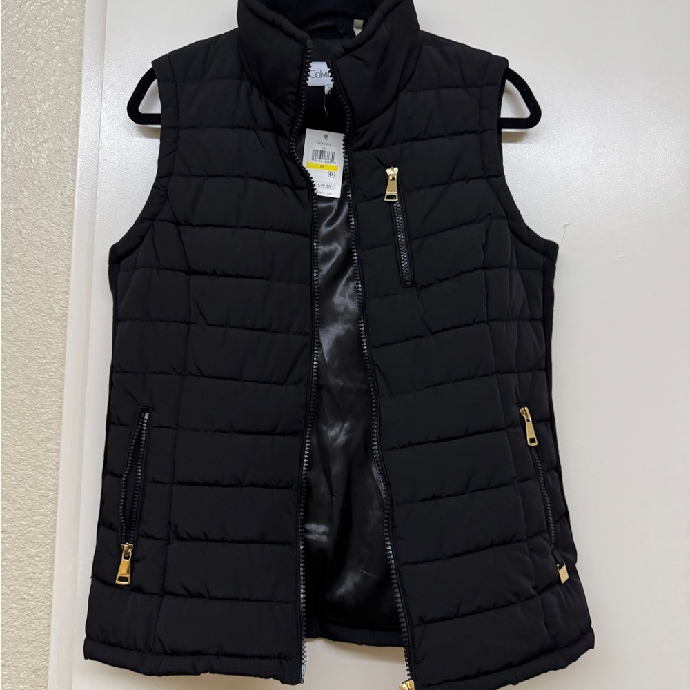 Calvin Klein Women’s Black Puffer Vest with Gold Accents size medium NWT